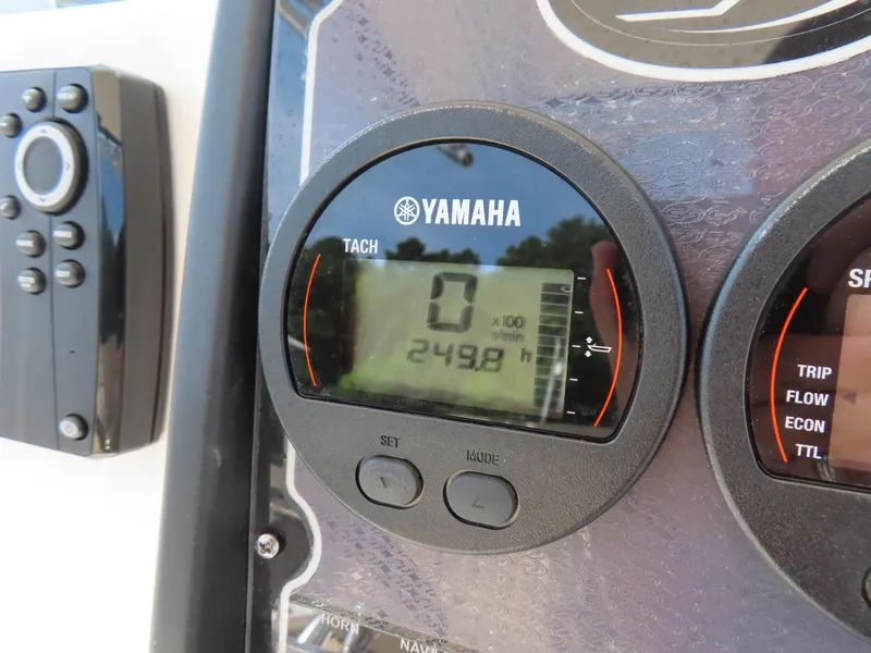Slide: The Image of Yamaha tachometer on 2018 Sea Fox 226 Commander boat dashboard, displaying 249.8 hours. - 26