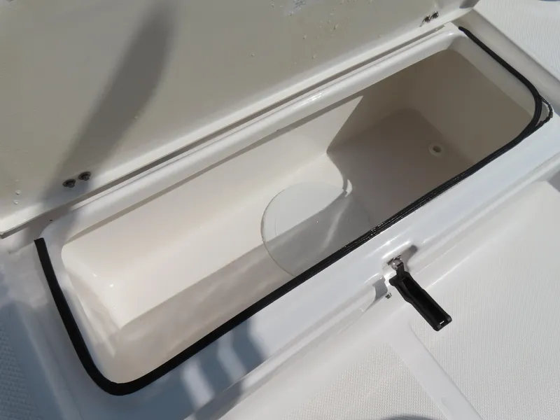 Slide: The Image of Open storage compartment on a 2018 Sea Fox 226 Commander boat. - 31