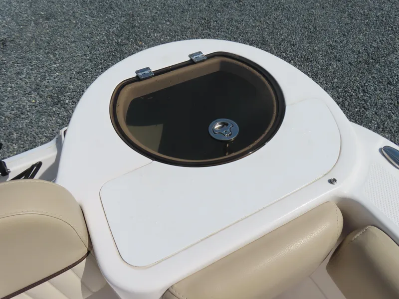 Slide: The Image of 2018 Sea Fox 226 Commander boat livewell with beige seating and white deck. - 32