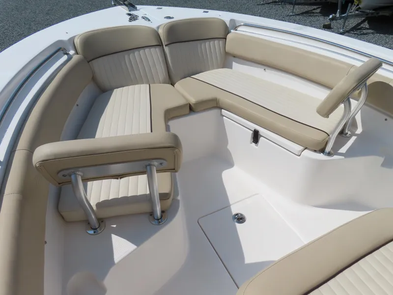 Slide: The Image of 2018 Sea Fox 226 Commander boat interior with beige cushioned seating. - 7