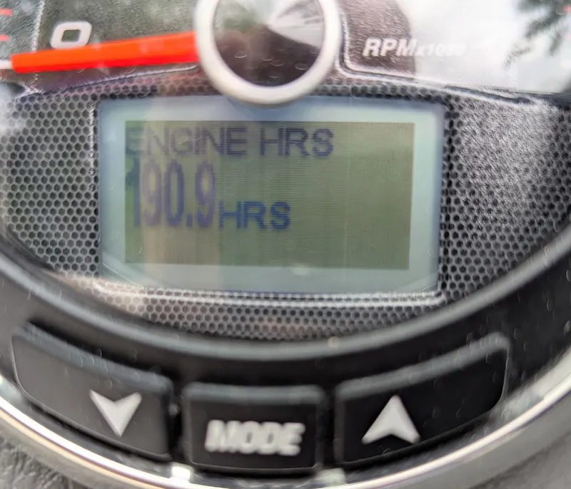 Slide: The Image of Close-up of 2016 Chaparral 216 SSi engine hour meter displaying 190.9 hours. - 10