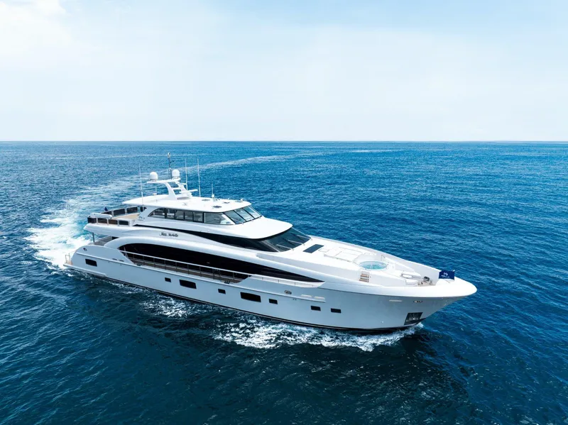 The Image of Luxurious 2025 Horizon 122RP yacht cruising on open sea at sunset. - 0