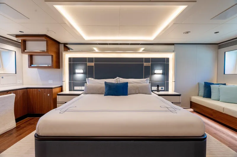 Slide: The Image of Luxurious interior of 2025 Horizon 122RP yacht with plush seating and panoramic windows. - 10