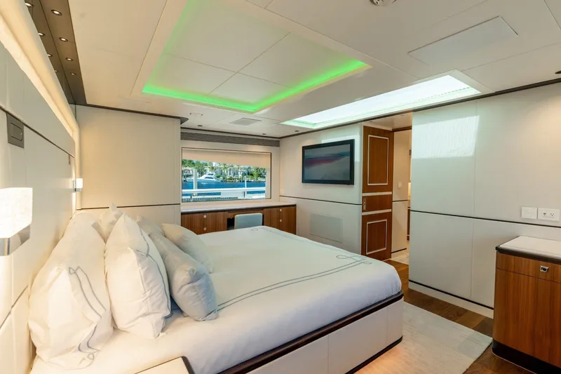 Slide: The Image of Luxurious Horizon 122RP 2025 yacht bedroom with modern decor and elegant furnishings. - 5