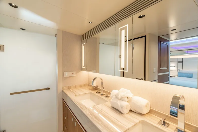 Slide: The Image of Luxurious bedroom interior on 2025 Horizon 122RP yacht, featuring elegant design and modern amenities. - 6