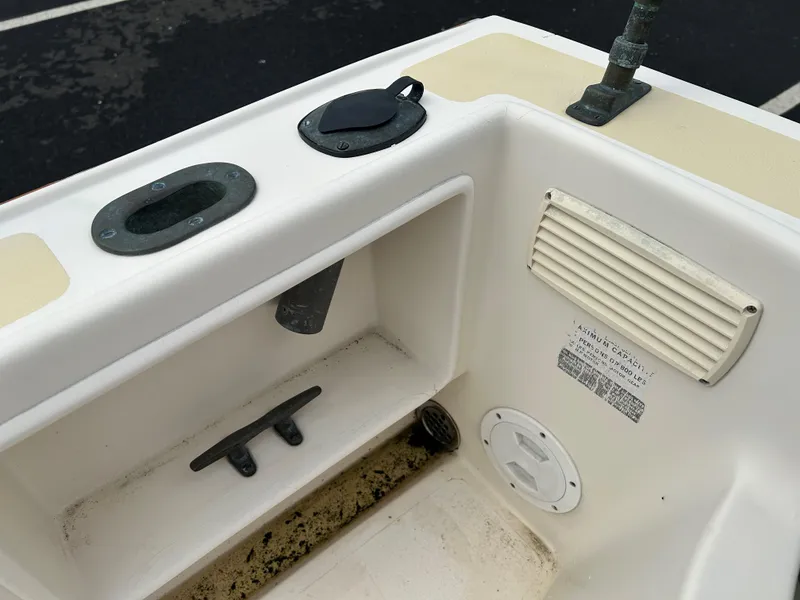 Slide: The Image of 2014 Nantucket Boat Works 17 Skiff interior with cleat and vent details. - 15