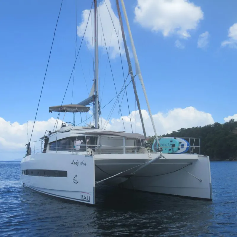 The Image of Bali 4.1 catamaran sailing on calm waters under a clear blue sky, 2020 model. - 0