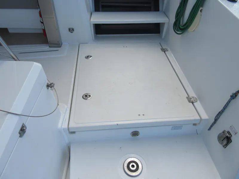 Slide: The Image of Bali 4.1 yacht deck area with storage hatch and steps, 2020 model. - 20