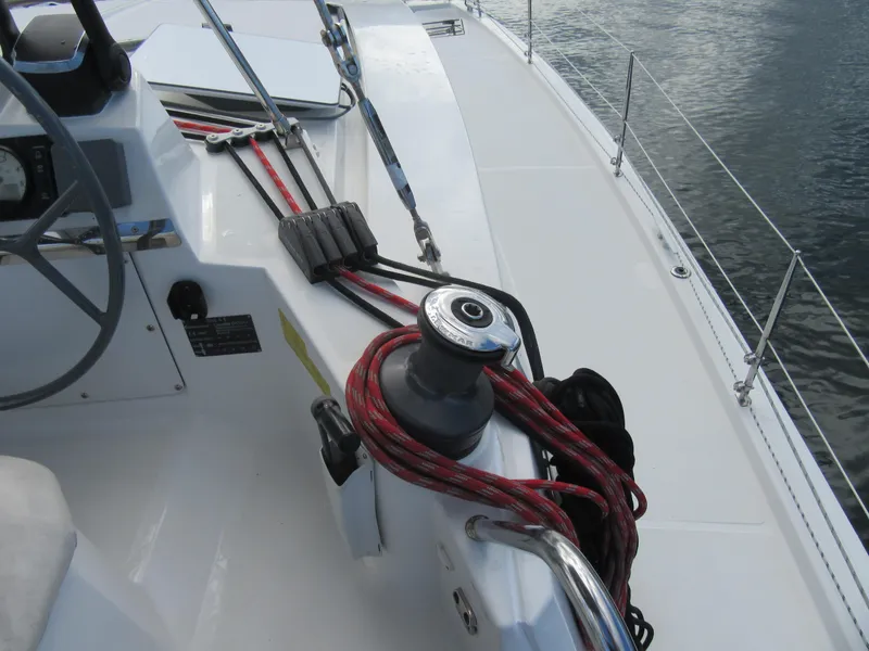 Slide: The Image of Sailboat deck with winch and ropes, Bali 4.1 model, 2020, near water. - 27