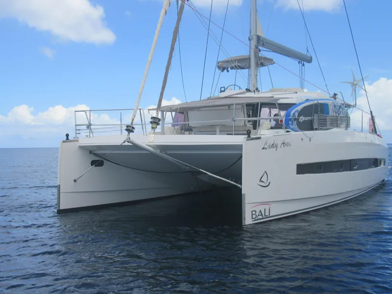 Slide: The Image of 2020 Bali 4.1 catamaran sailing on calm ocean under clear blue sky. - 3
