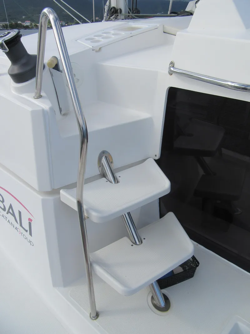 Slide: The Image of Stainless steel and white steps on a 2020 Bali 4.1 catamaran deck. - 39