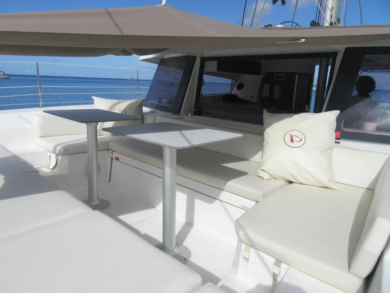 Slide: The Image of Luxurious seating area on a 2020 Bali 4.1 catamaran with ocean view. - 44