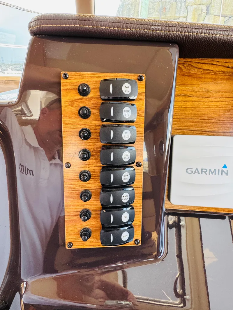 Slide: The Image of Control panel of 2018 Ranger Tugs R-27 boat with Garmin device. - 37