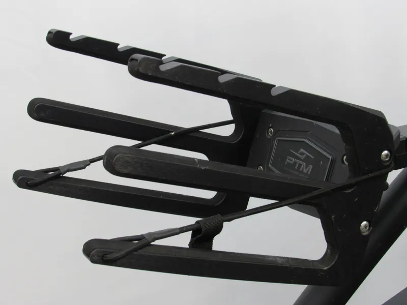 Slide: The Image of Close-up of a PTM bracket on a 2024 Yamaha Boats 255XD. - 16