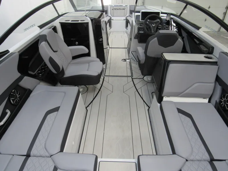 Slide: The Image of 2024 Yamaha Boats 255XD interior with modern seating and sleek design. - 4