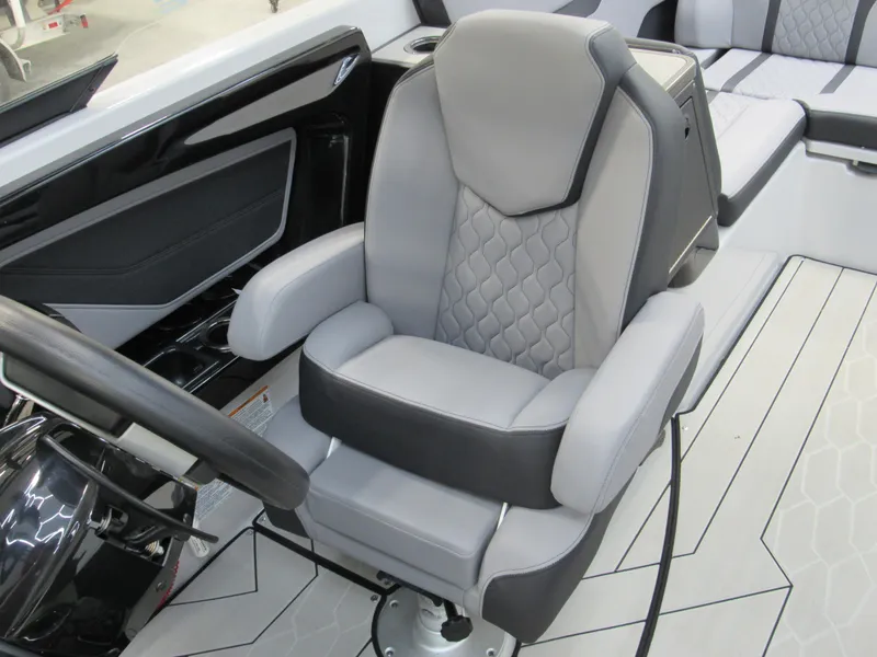 Slide: The Image of 2024 Yamaha Boats 255XD captain's chair with sleek, modern design and comfortable upholstery. - 8