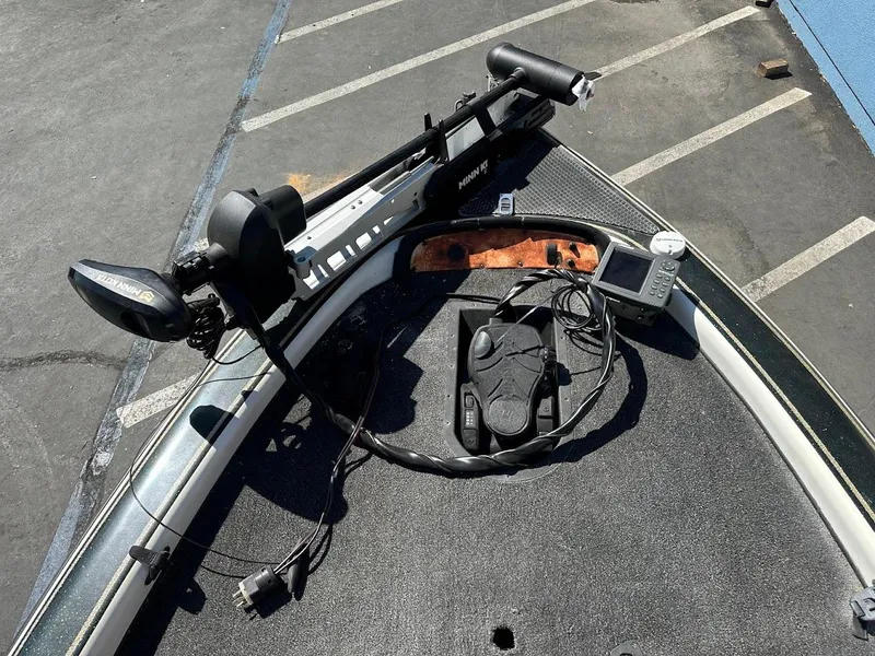 Slide: The Image of Bow of a 1999 Fisher 21 FX DC boat with trolling motor and fish finder. - 20