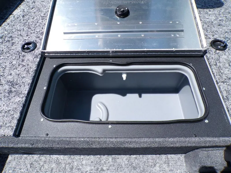 Slide: The Image of Open storage compartment on 2025 Tracker Pro Team 175 TF® boat. - 18