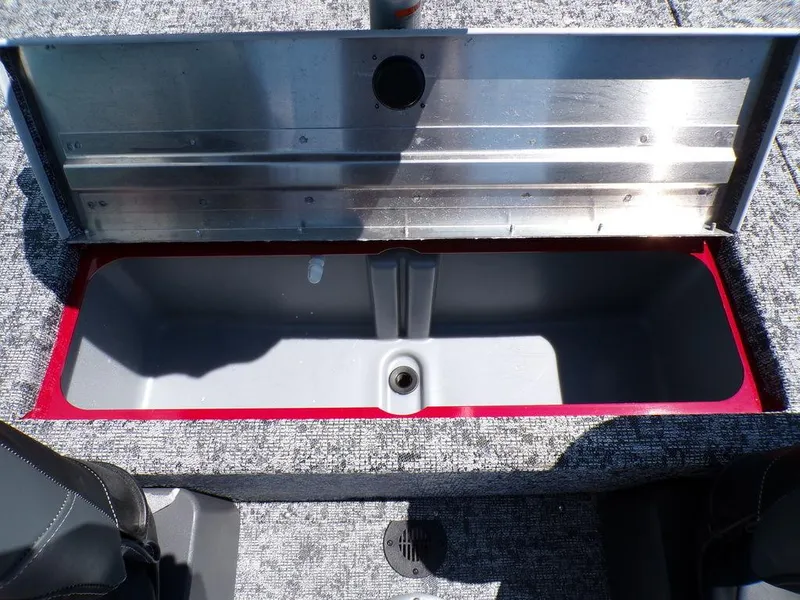 Slide: The Image of Open storage compartment in 2025 Tracker Pro Team 175 TF® boat. - 19