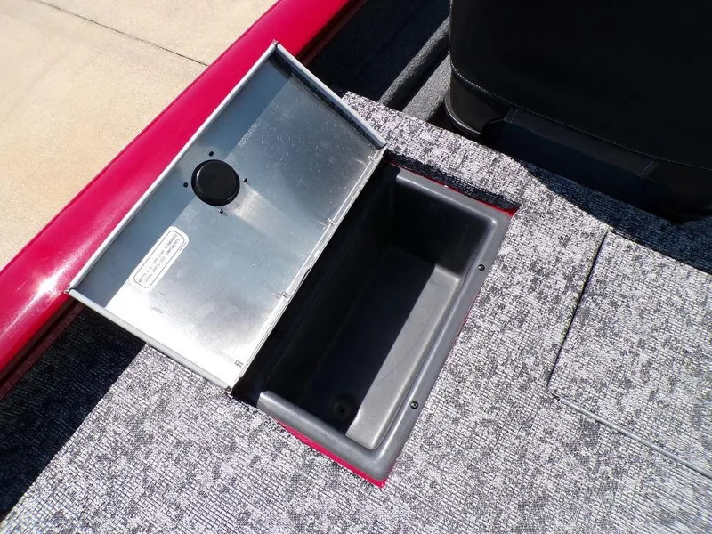 Slide: The Image of Open storage compartment on 2025 Tracker Pro Team 175 TF® boat. - 20