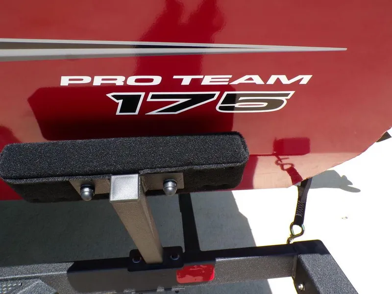 Slide: The Image of 2025 Tracker Pro Team 175 TF boat, red exterior with logo detail. - 5
