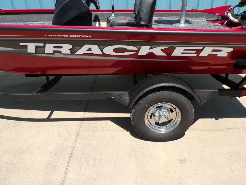 Slide: The Image of 2025 Tracker Pro Team 175 TF® Crappie Edition boat on trailer, side view. - 6