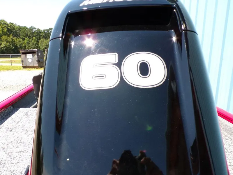 Slide: The Image of Outboard motor with "60" label on a 2025 Tracker Pro Team 175 TF boat. - 8