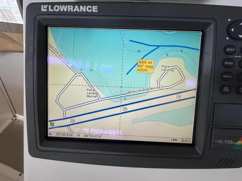 Slide: The Image of Lowrance GPS display on 1999 Silverton 392 Aft Cabin, showing Paris Landing Marina map. - 14