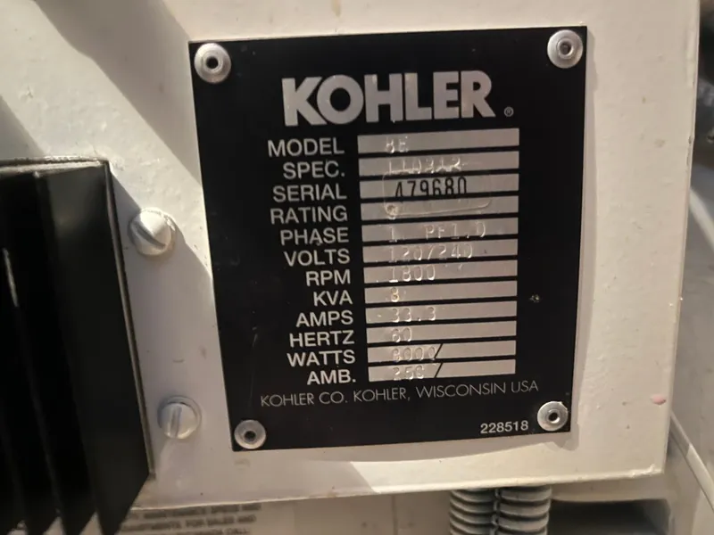 Slide: The Image of Kohler generator specification plate on a 1999 Silverton 392 Aft Cabin boat. - 35