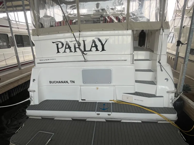 Slide: The Image of 1999 Silverton 392 Aft Cabin boat docked, named "Parlay," Buchanan, TN. - 5