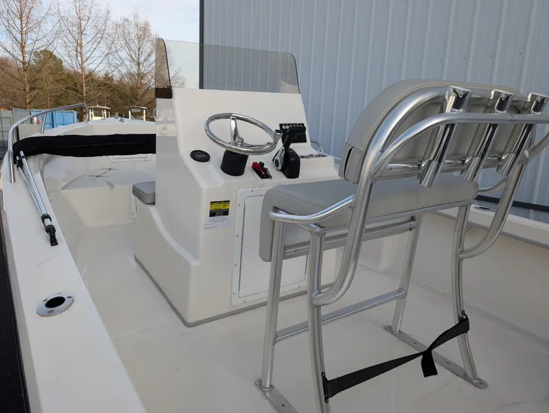 Slide: The Image of 2024 May-Craft 1900CC boat interior with steering console and seating. - 10