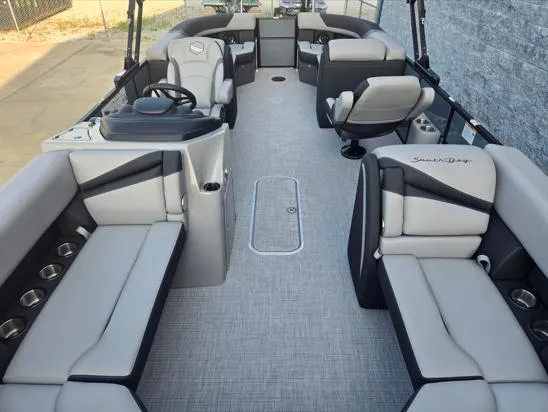 Slide: The Image of 2026 South Bay S224RS pontoon boat interior with plush seating and modern design. - 3