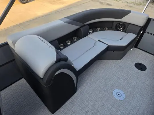 Slide: The Image of Luxurious seating on 2026 South Bay S224RS boat with cup holders and sleek design. - 4