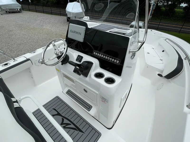Slide: The Image of 2024 Tidewater 198 CC Adventure boat interior with Garmin navigation system. - 20