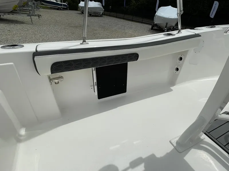 Slide: The Image of 2024 Tidewater 198 CC Adventure boat interior with sleek seating and modern design. - 31