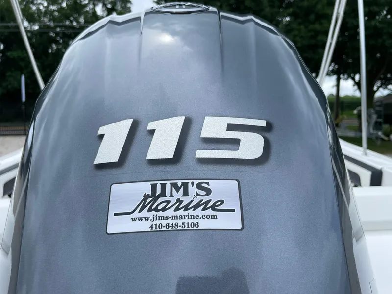 Slide: The Image of 2024 Tidewater 198 CC Adventure boat engine with "115" and Jim's Marine sticker. - 38