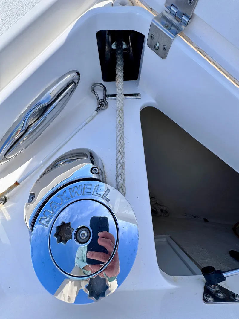 Slide: The Image of Maxwell winch on 2017 Intrepid 375 FE boat, featuring rope and metal components. - 13