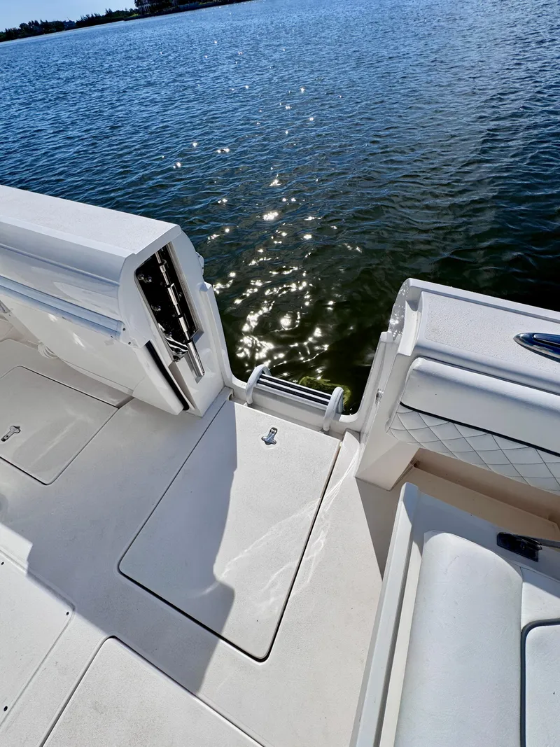 Slide: The Image of 2017 Intrepid 375 FE boat deck with water view. - 15