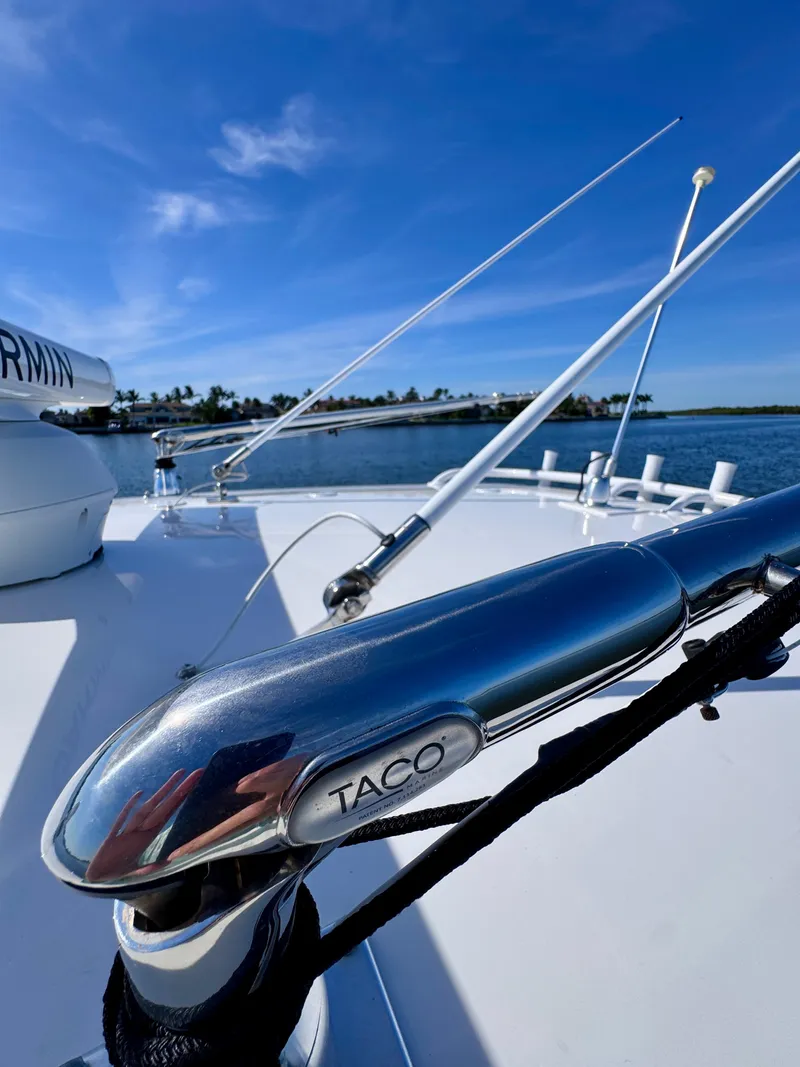 Slide: The Image of Close-up of a 2017 Intrepid 375 FE boat cleat with blue sky background. - 18
