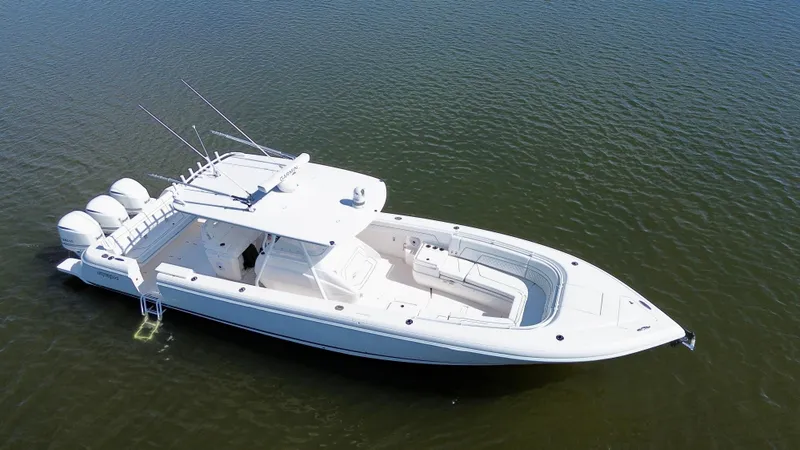 Slide: The Image of 2017 Intrepid 375 FE boat on calm water, aerial view. - 30