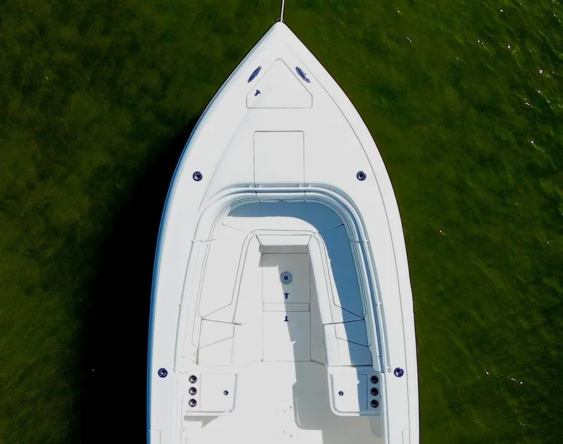 Slide: The Image of Top view of 2017 Intrepid 375 FE boat on green water. - 21