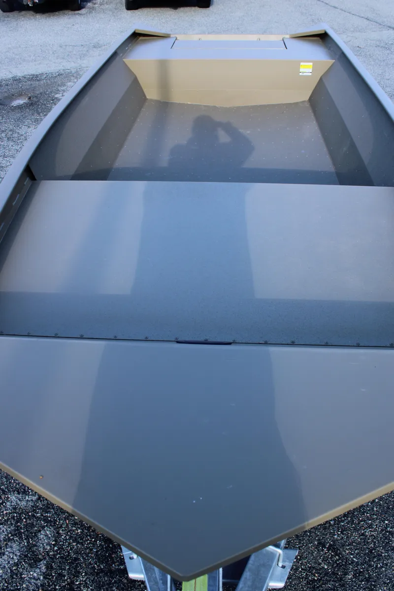 Slide: The Image of 2025 G3 Gator Tough 1860 VBW boat interior, showing spacious deck and durable construction. - 9