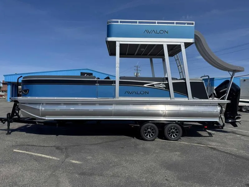 Slide: The Image of 2025 Avalon 2585 27 Catalina CRFS pontoon boat with slide, parked on trailer. - 13