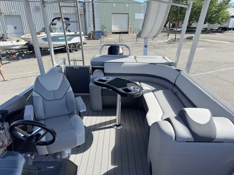 Slide: The Image of 2025 Avalon 2585 27 Catalina CRFS pontoon boat interior with seating and steering wheel. - 22