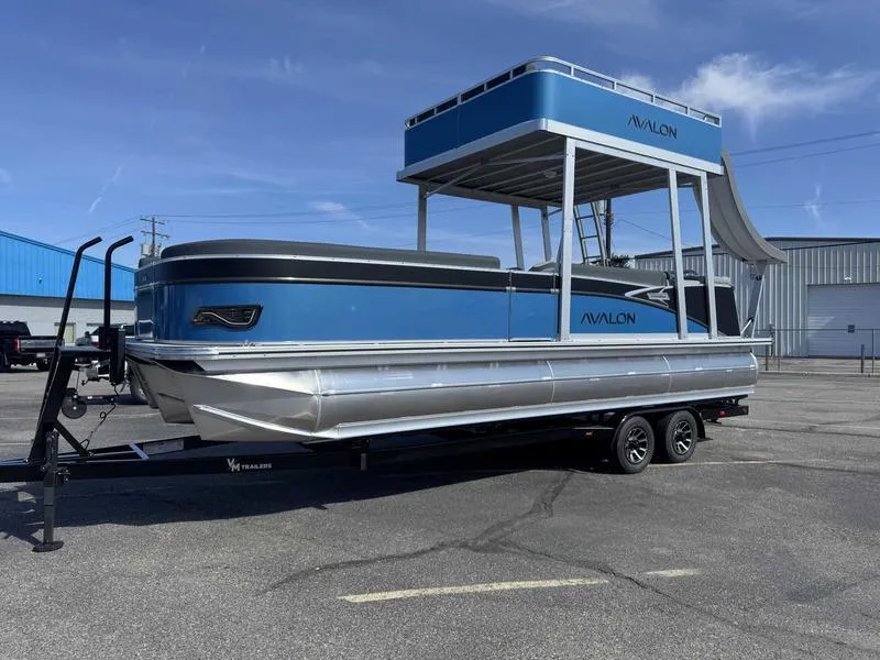 Slide: The Image of 2025 Avalon 2585 27 Catalina CRFS pontoon boat on trailer, blue and silver design. - 3