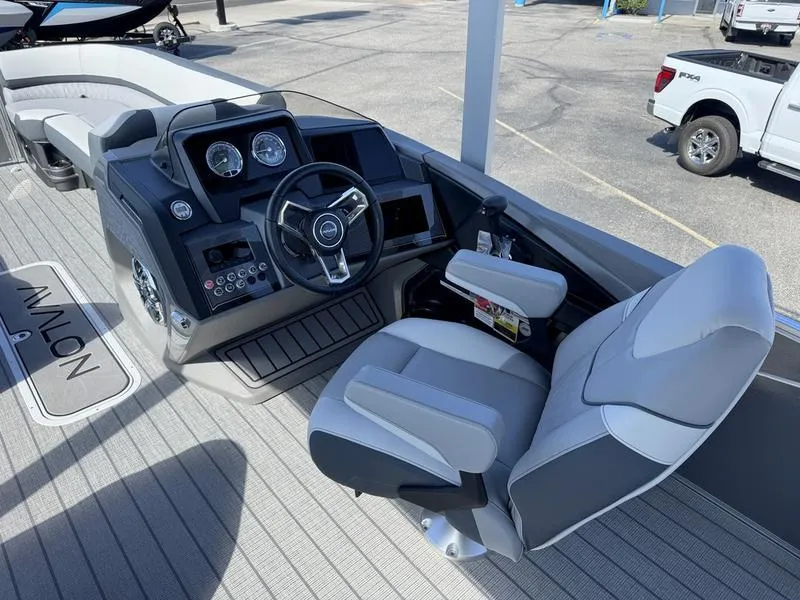 Slide: The Image of 2025 Avalon 2585 27 Catalina CRFS boat cockpit with modern steering and controls. - 4