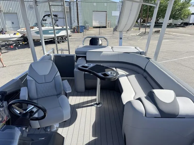 Slide: The Image of 2025 Avalon 2585 27 Catalina CRFS pontoon boat interior with seating and helm. - 8