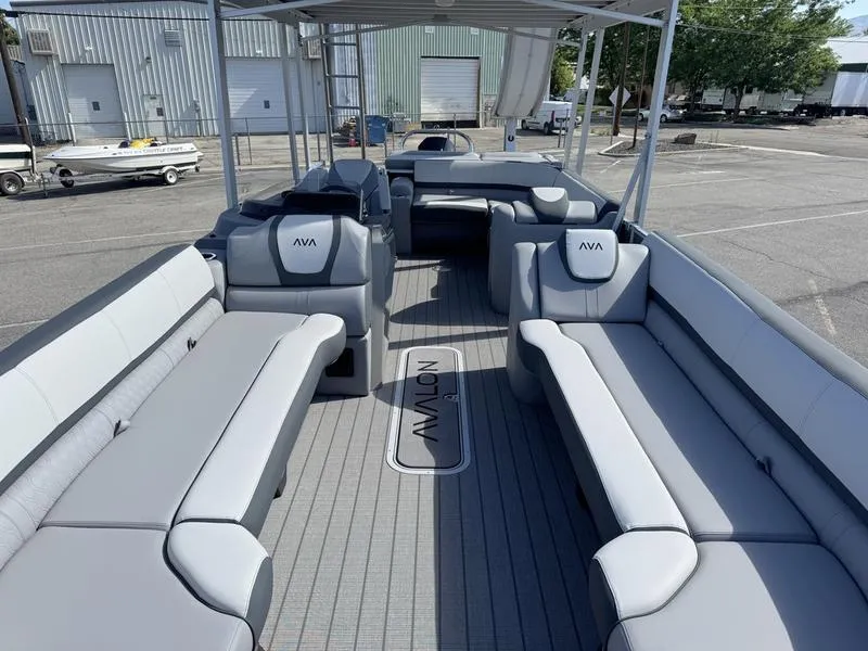 Slide: The Image of Luxurious 2025 Avalon 2585 27 Catalina CRFS pontoon boat with spacious seating and modern design. - 9