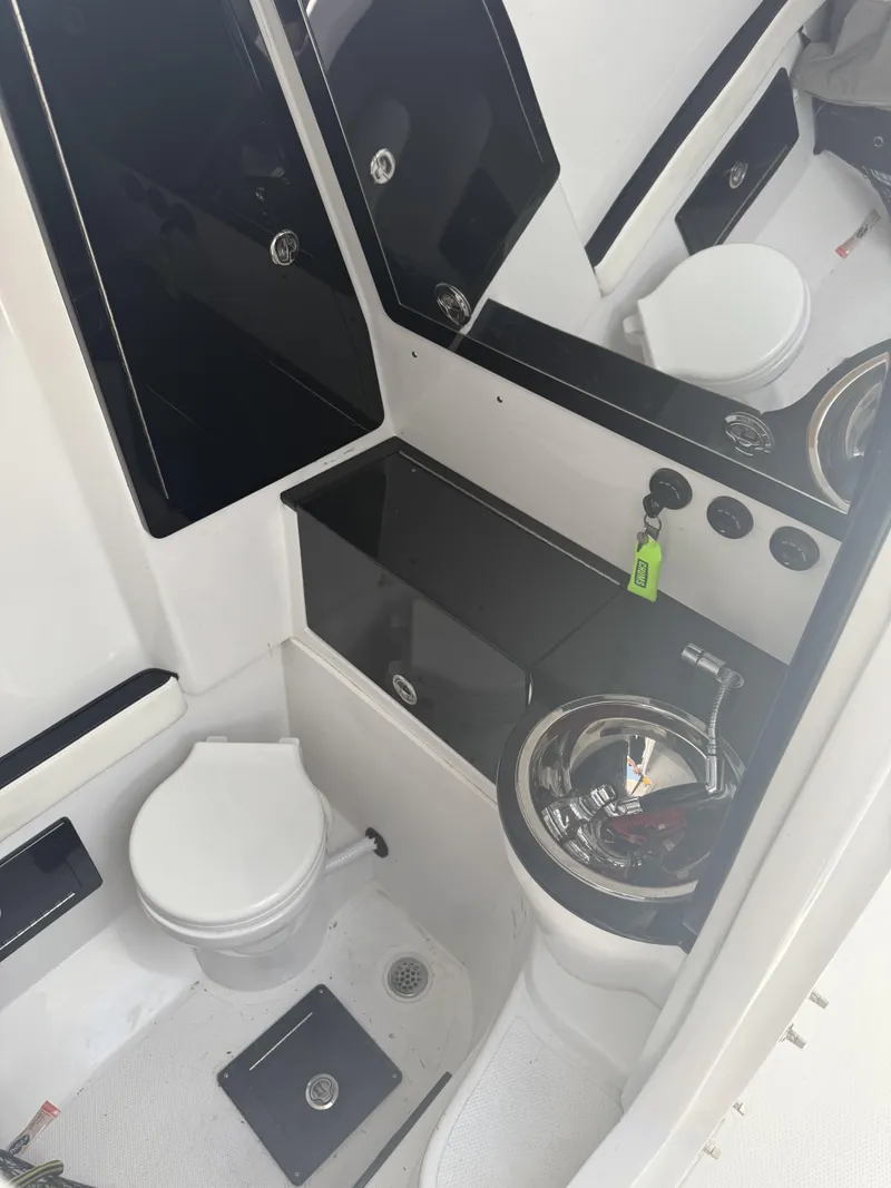 Slide: The Image of 2023 Renegade 38' Open boat bathroom with modern fixtures and sleek design. - 15