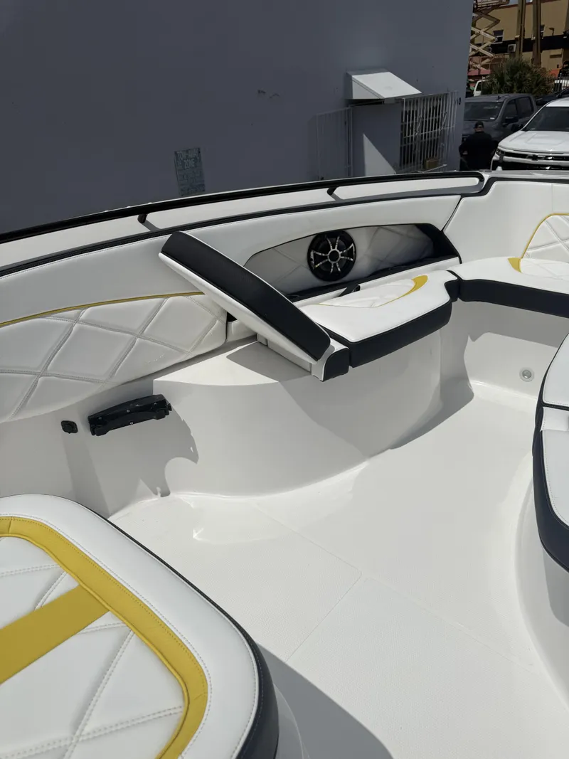 Slide: The Image of 2023 Renegade 38' Open boat interior with white and yellow seating. - 3